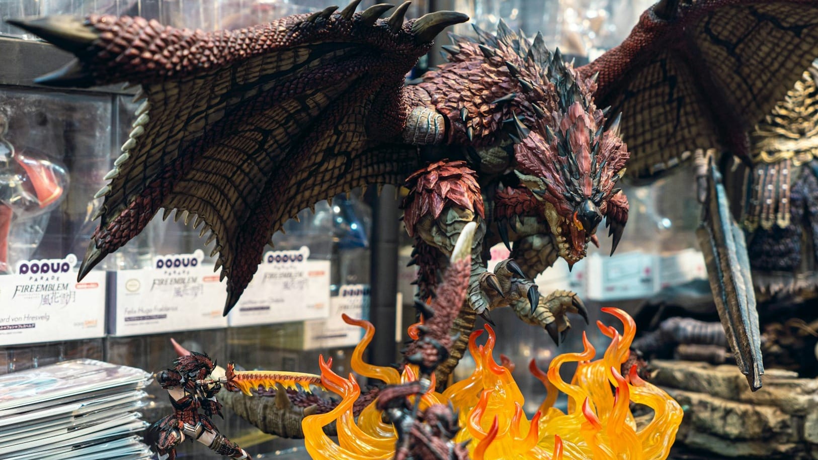 A close up of a dragon figure from Monster Hunter on a table